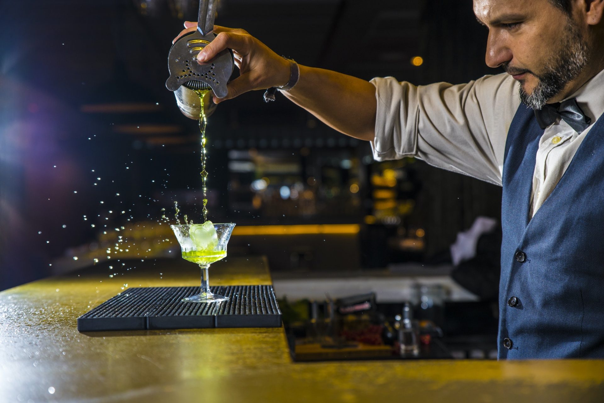 barman-is-making-cocktail-at-night-club-1.jpg